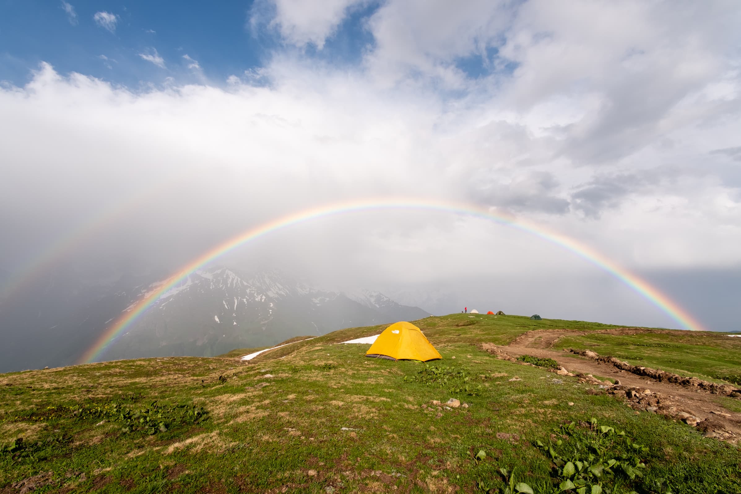 Rainbow arching over our tent after a storm at Koruldi lakes, Svaneti, Georgia