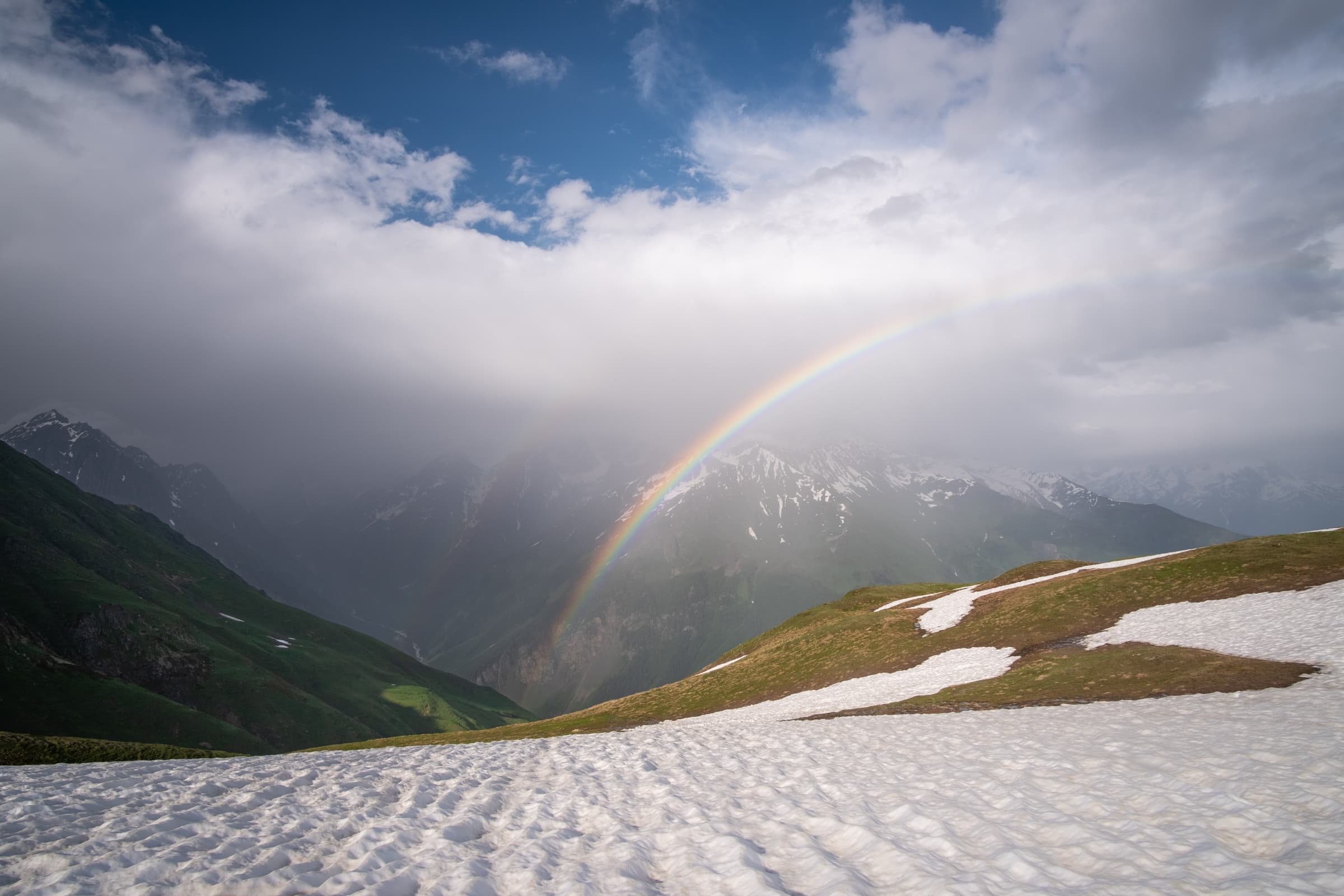 Rainbows, snow and clouds from Koruldi lakes