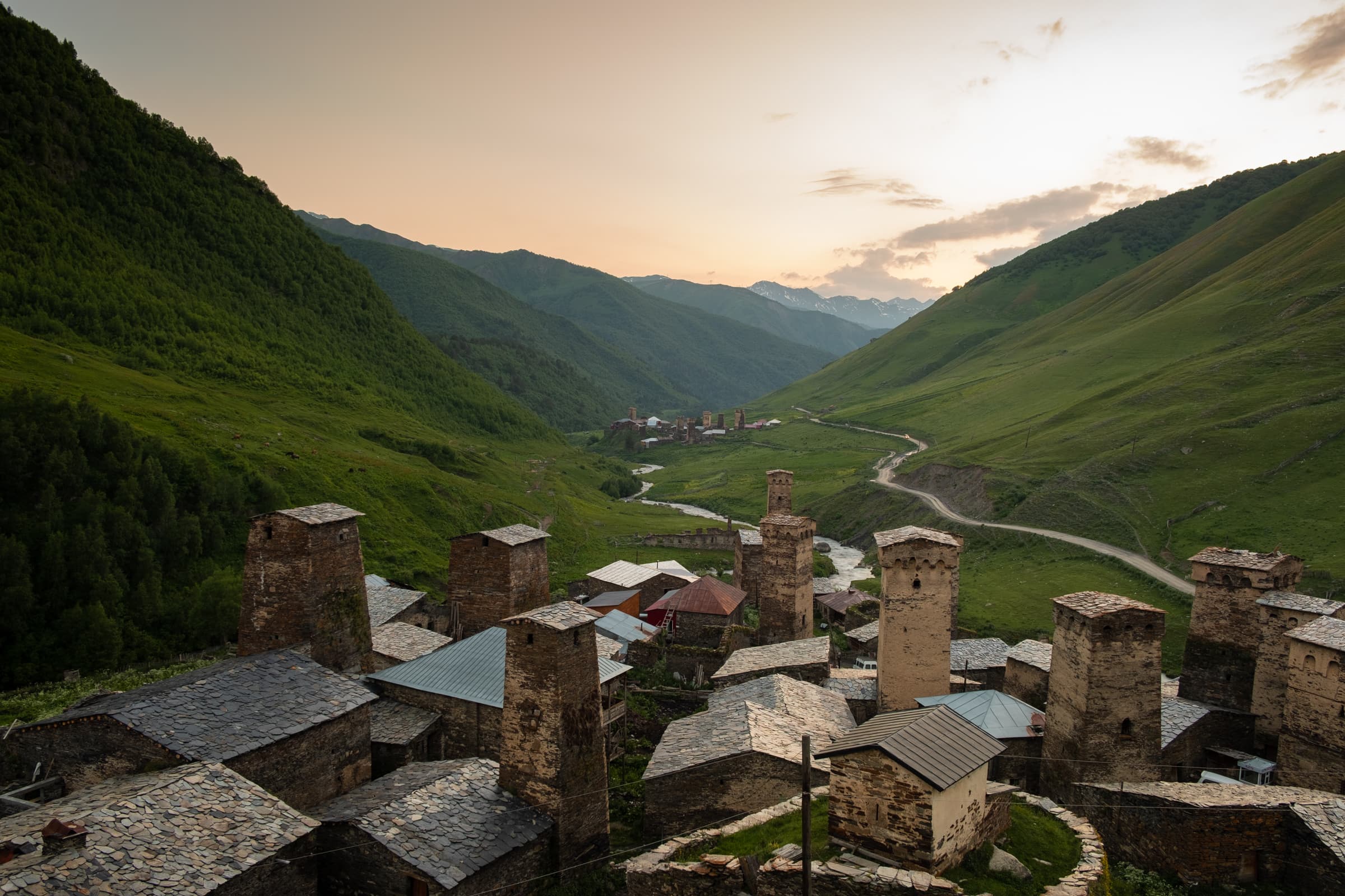 Warm summer sunset over the medieval Svan towers of Ushguli, Georgia