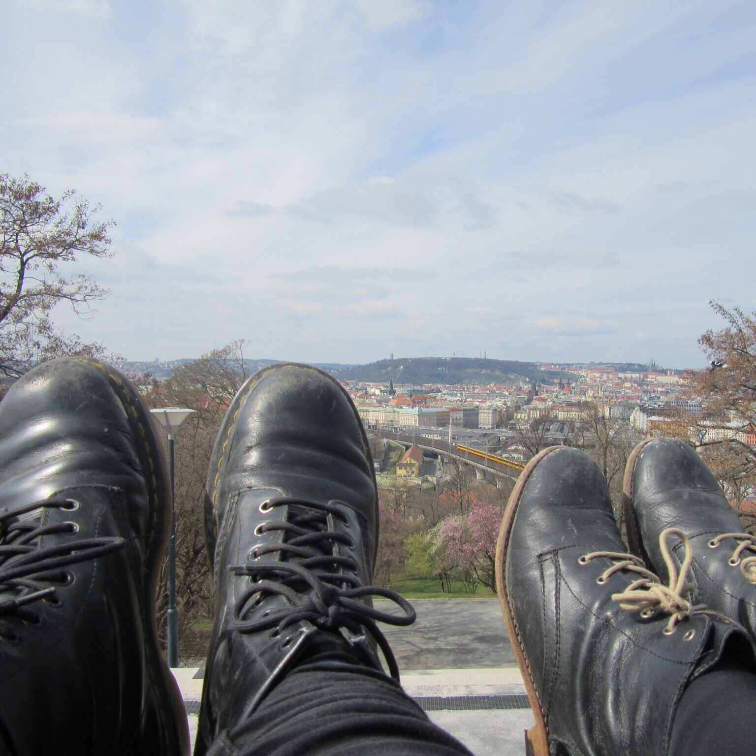 Aydin + Caroline sitting above Bratislava