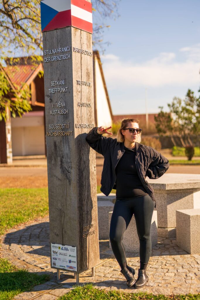 Caroline posing at the border between Austria and Slovakia