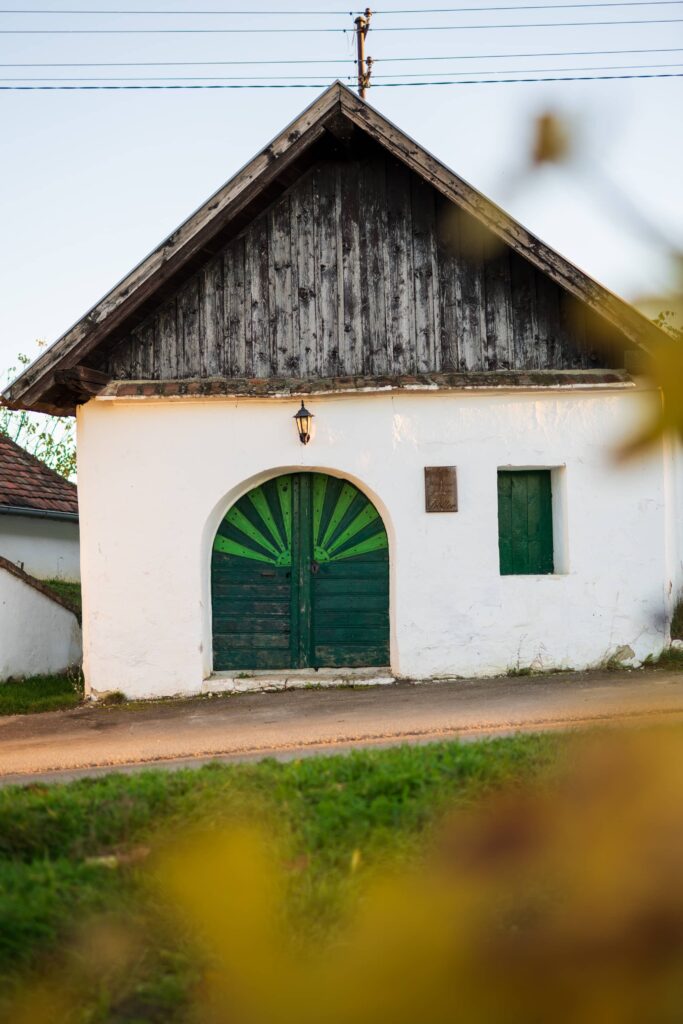 Wine cellar building with decorative green door in Zellerndorf (Maulavern) Kellergasse