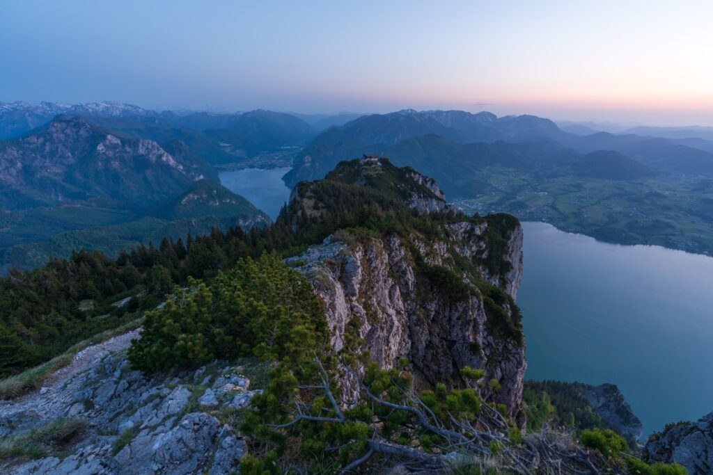 Last light from Traunstein mountain, looking over Traunsteinhaus and lake Traunsee